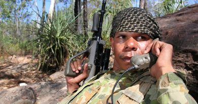 North West Mobile Force soldier Private Corinthian Noketta from the Wallman Community in Turkey Creek radios information to command elements during a patrol activity on Operation Resolute on Groote Eylandt in the Gulf of Carpentaria. Photo by Gunner Shannon Joyce. 24 year-old Private Corinthian joined NORFORCE in 2001 and works as a signaller and coax man on water patrols. Private Corinthian is a Community Dole Project (CDP) participant at home, but wants to get training as a ranger to do more for his land. When Private Corinthian returns from patrol, the first thing he plans to do is roll out his 1980 Falcon Fairmont for a cruise around Katherine. Private Corinthian plays Australian Rules Football for Klarno.