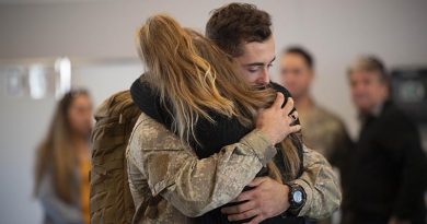A New Zealand soldier bound for Operation Manawa 9 says good bye at RNZAF Base Ohakea Air Movements terminal. NZDF photo.
