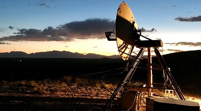 Raytheon’s troposcatter system transmitting during U.S. Army field testing. The system works by scattering signals in the troposphere to overcome the limits of terrain and the potential loss of satellite availability. Raytheon image.