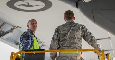 USAF and RAAF C-17 maintainers work together on a RAAF C-17A Globemaster III. Photo by Corporal Brenton Kwaterski.