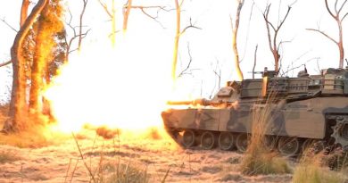 An Australian Army M1A1 Abrams fires in bushland at Shoalwater Bay Training Area, Queensland.