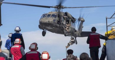 Colombian Marines fast-rope onto the flight deck of Whidbey Island-class Dock Landing Ship USS Gunston Hall during UNITAS 2018. US Navy photo by Mass Communication Specialist 3rd Class Colbey Livingston.