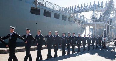 Ship’s company of HMAS Success march off the ship for the last time during her decommissioning ceremony at Fleet Base East, Sydney. Photo by Chief Petty Officer Cameron Martin.