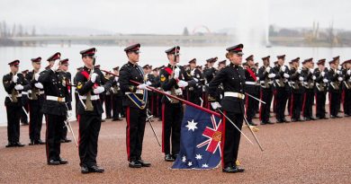 Royal Military College Corps of Staff Cadets and the Colour Party giving a Royal Salute during the annual Queen's Birthday Parade at Rond Terrace, Canberra. Photo by Grace Costa Banson.