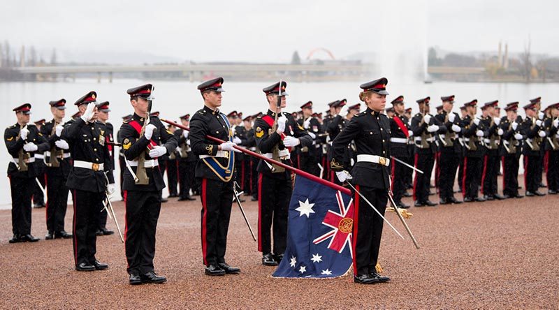 Royal Military College Corps of Staff Cadets and the Colour Party giving a Royal Salute during the annual Queen's Birthday Parade at Rond Terrace, Canberra. Photo by Grace Costa Banson.