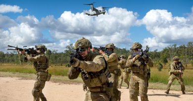 Australian Army riflemen from the 6th Battalion, Royal Australian Regiment, conduct a simulated assault with United States Marine Corps MV-22 Osprey support at Shoalwater Bay Training Area. Photo by Corporal Tristan Kennedy.