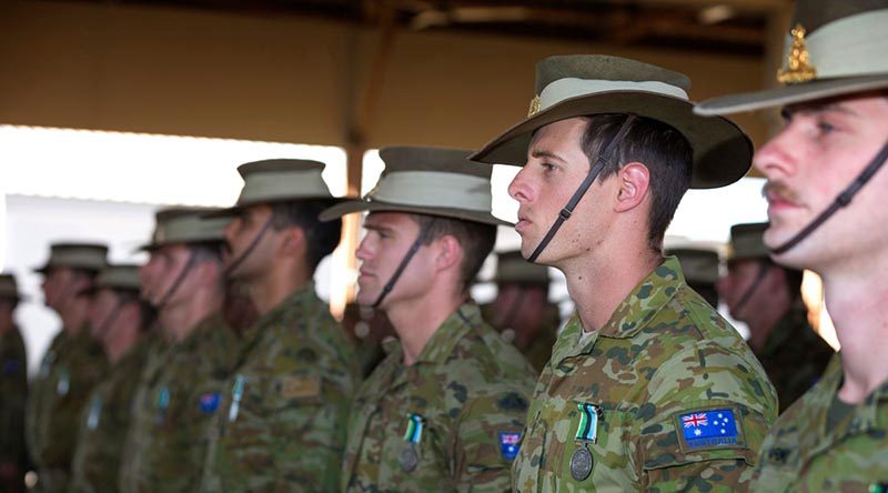 Australian Army soldiers of Task Group Taji 8 on parade after receiving their mission medals at the Taji Military Complex, Iraq. Photo by Corporal Oliver Carter.