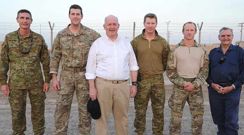 Governor-General Sir Peter Cosgrove with Australian Victoria Cross recipients (from right), Keith Payne VC, Corporal Mark Donaldson VC, Corporal Daniel Keighran VC and Corporal Ben Roberts-Smith VC MG, and then Chief of Army Lieutenant General Angus Campbell, on a visit to Australian troops in Baghdad, Iraq (August 2015).