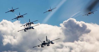 F/A-18A Hornets from No.77 Squadron at RAAF Base Williamtown in formation to celebrate the unit's 77th anniversary. Photo by Corporal Craig Barrett.