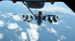 An F-18G Growler takes on fuel from a US Air Force KC-10 during Exercise Talisman Sabre 2019. Photo by Christabel Migliorini.