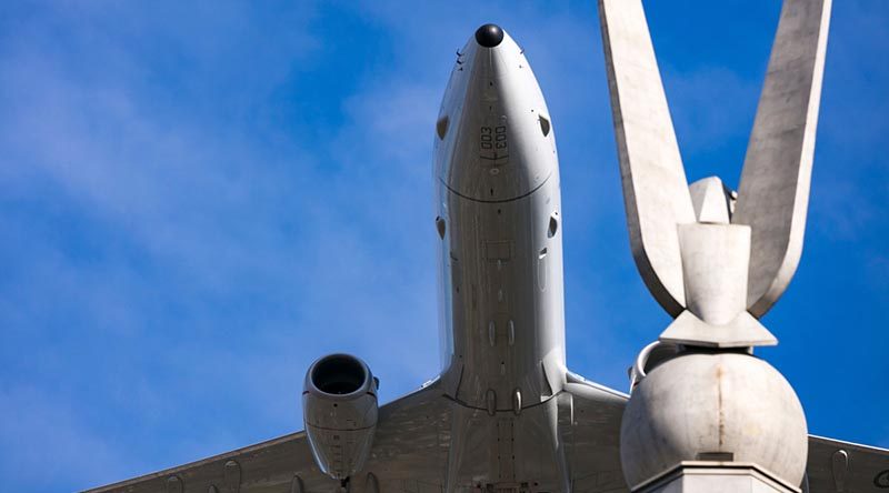 A RAAF P-8 Poseidon flies over the Russell Offices 'chook on a stick' during the Chief of Air Force change-of-command parade. Other aircraft, all of which had been introduced into RAAF service during Air Marshal Leo Davies' tenure, also flew over – including EA-18G Growler, F-35 Lightning and Falcon 7X. Photo by Chief Petty Officer Cameron Martin.