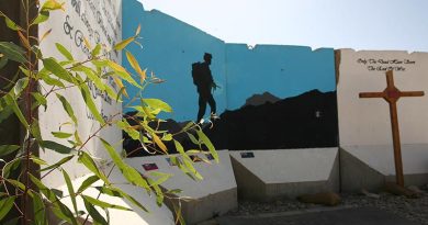 'T-wall' art in Tarin Kot, Afghanistan. Photo by Brian Hartigan