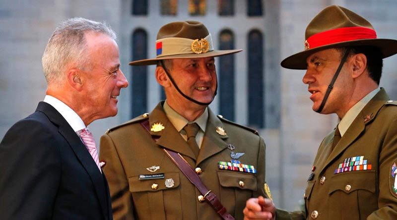 Director of the Australian War Memorial Brendan Nelson speaks with Sergeant Major of the New Zealand Army Warrant Officer Class One Clive Douglas as Regimental Sergeant Major of the Australian Army Warrant Officer Grant McFarlane watches on. Photo by Corporal Veronica O'Hara.