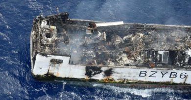 A Royal New Zealand Air Force P-3K2 Orion photographs the Chinese fishing vessel Jin Xiang 6, damaged by fire west of Tuvalu. NZDF photo.