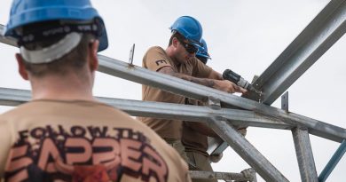 Australian Army carpenter Sapper David Mikic from 1st Combat Engineer Regiment fixes purlins to steel frames at Metinaro Military Base, Timor-Leste, during Exercise Hari'i Hamutuk 2016. Photo by Corporal Nunu Campos.