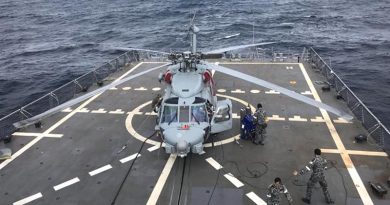 HMAS Hobart’s embarked MR-60R helicopter ‘COBRA 16’ during first-of-class flight trials off the east coast off Australia. Photo by Lieutenant Commander Sidney Raper.