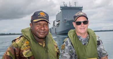 Commander Sebastian Marru of the Papua New Guinea Defence Force Maritime Element, and the Commanding Officer HMAS Choules Commander Scott Houlihan at Tarangau Naval base, Manus Island. Photo by Petty Officer Justin Brown.