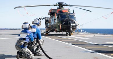 HMAS Canberra's flight deck team conduct crash-on-deck training with a grounded MRH-90 helicopter during Exercise Talisman Sabre 2019. Defence made no mention of the fleet-wide MRH90 grounding until asked by media nearly two weeks after this photo was published. Photo by Leading Seaman Richard Cordell.