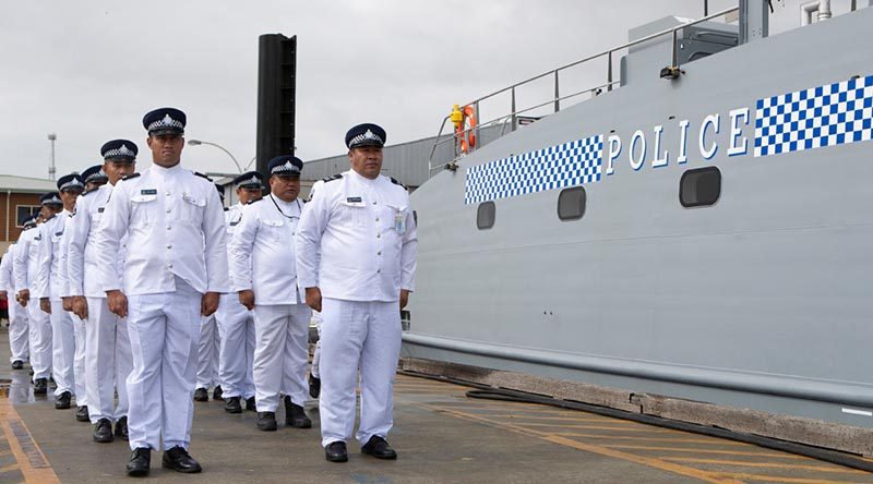 Samoan Police crew of Nafanua II fall in alongside their newly aquired Guardian-class patrol boat at Austal ship yards in Henderson, Western Australia. Photo by Leading Seaman Richard Cordell.