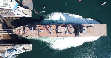 NUSHIP Stalwart slips into the water in Ferol, Spain, during her well-attended ceremonial launch. Navantia drone image.