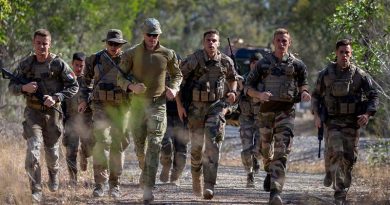 Soldiers from the New Caledonian Armed Forces run in an endurance event, with an Australian Army officer as their observer, during Exercise Hydra 2019 at Greenbank Training Area, Queensland, Australia. Photo by Gunner Sagi Biderman.