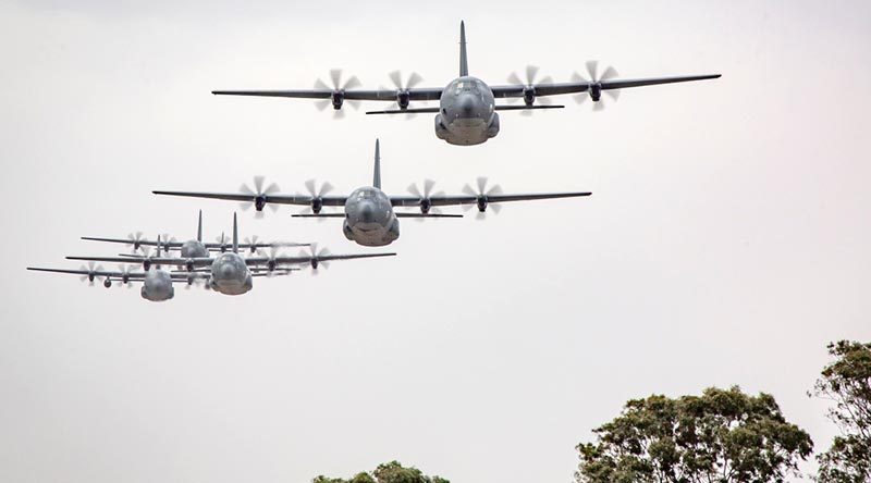 C-130J Hercules aircraft from No.37 Squadron fly in formation over RAAF Base Richmond. Photo by Corporal Craig Barrett.