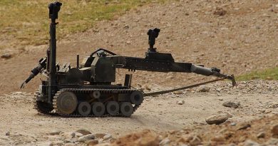 A remote control robot, operated by Australian Engineers from the 1st Mentoring and Reconstruction Task Force moves in, to deal with an improvised explosive device, which the Australian troops uncovered during Operation Zamarai Silawel. Photo by Corporal Ricky Fuller.