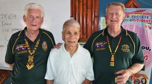 President of the SA/NT Branch NMBVAA Brian Selby (right) and Vice-President Don Cameron at Sekolah Kebangsaan Stass, with Abang, who supported the Australians as an Iban Tracker during Confrontation.