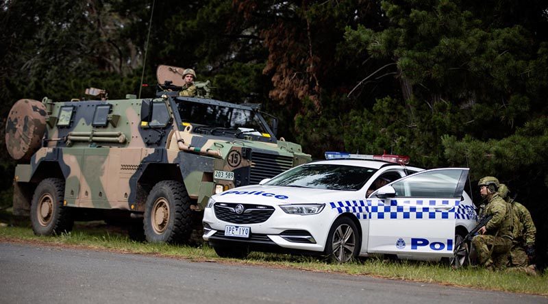 Australian soldiers provide support to the Victoria Police during a training scenario on Exercise Austral Shield 2019. Photo by Corporal Jessica de Rouw.