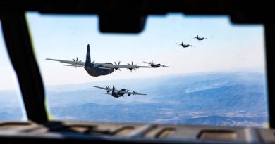 Five No 37 Squadron C-130J Hercules fly in formation to celebrate 20 years of C-130J operations in Australia. Photo by Corporal David Said.