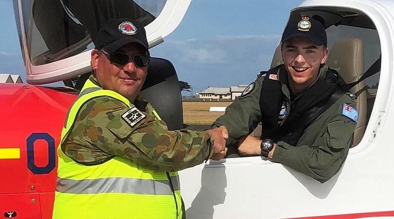 Cadet Corporal Max Ramm is congratulated by the Course Coordinator and Staff Officer Operations with AOW, Squadron Leader (AAFC) Scott Wiggins, following his first solo powered flight on 18 April 2019. Image supplied by SQNLDR (AAFC) Scott Wiggins.