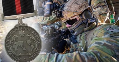 Australian Army soldiers from 2nd Commando Regiment onboard a 6th Aviation Regiment Black Hawk. Photo by Corporal Kyle Genner.