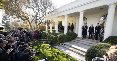 President Donald Trump, Vice President Mike Pence and First Lady Melania Trump present Conan to the media outside the White House, while the dog's special-forces handlers maintain their anonymity by staying in the Oval Office. White House photo.