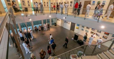 Defence personnel, family members and guests at the inaugural Fleet Base West Photographic Competition awards ceremony at the Gary Hall Community Centre, Rockingham, Western Australia. Photo by Leading Seaman Ernesto Sanchez.