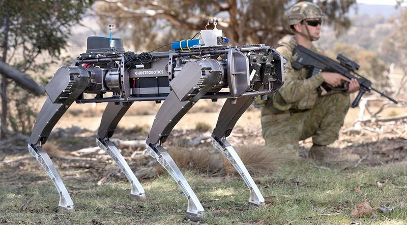 A Ghost Robotics unmanned ground vehicle supports Australian soldiers in clearing an enemy position. Photo by Corporal Tristan Kennedy.