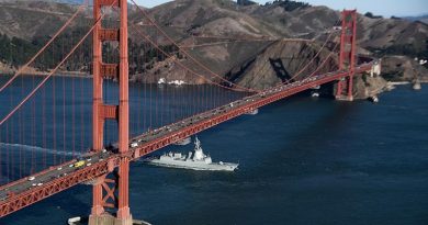 HMAS Brisbane under the Golden Gate Bridge during a port visit to San Francisco, California during her Combat System Qualification Trials.