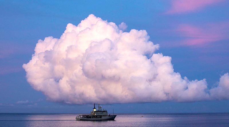 HMAS Leeuwin transits the Hinatuan Passage during a commemorative service for the 75th anniversary of the Battle of Surigao Strait in the Philippines. Photo by Leading Seaman Tara Byrne.