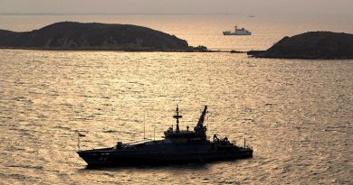 Royal Australian Navy Armidale-class patrol boat HMAS Larrakia at anchor in Port Moresby during APEC 2018. Photo by Chief Petty Officer Cameron Martin.