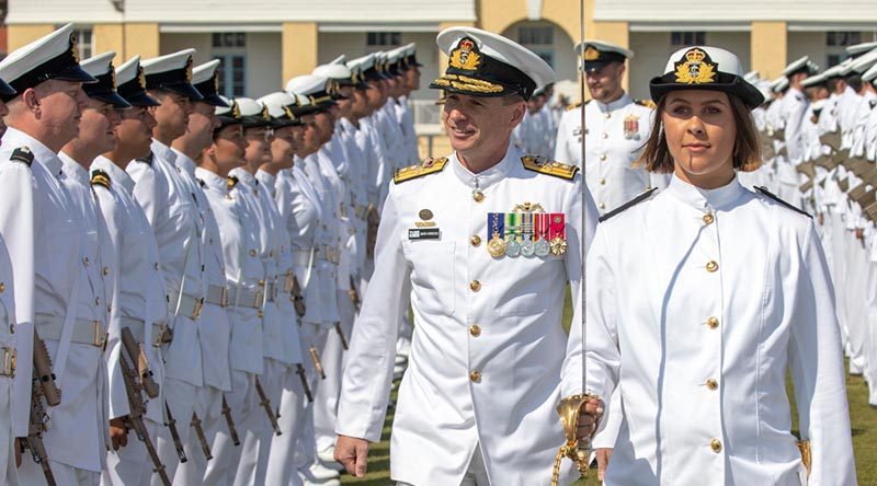 The reviewing officer of the New Entry Officers Course 61 graduation parade, Deputy Chief of Navy, Rear Admiral Mark Hammond, inspects the guard at HMAS Creswell. Photo by Chief Petty Officer Cameron Martin.