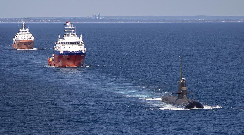 HMAS Sheean leads MV Mega Bakti and MV Besant to out of Fleet Base West for sea-phase elements of Exercise Pacific Reach 2019. Photo by Petty Officer James Whittle.