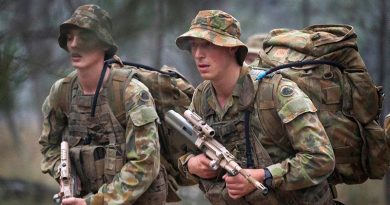 Australian soldiers march with packs at the Royal Australian School of Infantry in Singleton. Photo by Sergeant Janine Fabre.