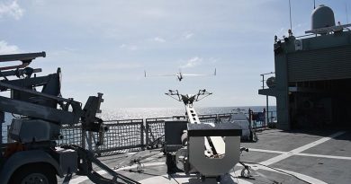 A ScanEagle remotely piloted aircraft is launched by pneumatic catapult from the flight deck of HMAS Leeuwin during first-of-class flight trials in real-world conditions on the ship's current Asian deployment. Photo by Lieutenant Michael Azoury.