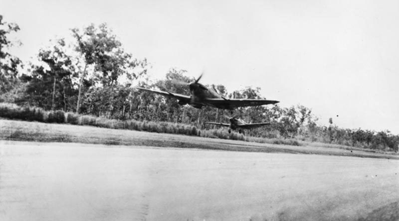 Two Spitfires take off from an airstrip near Darwin, 24 March 1943. AWM 014484.