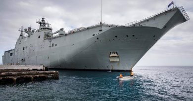 Vuna Wharf employees provide support to HMAS Adelaide in Nuku'alofa, Tonga. Photo by Corporal Jessica de Rouw.