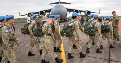 Members of a Vietnam People's Army medical team board a Royal Australian Air Force C-17A Globemaster in Hanoi, Vietnam, for transport to the Vietnamese Field Hospital supporting the United Nation's mission in South Sudan. Photo by Sergeant Christopher Dickson.