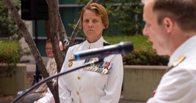 Chief of Navy Vice Admiral Michael Noonan presents Warrant Officer Deb Butterworth with her promotion certificate as the newly appointed Warrant Officer of the Royal Australian Navy, at Russell Offices. Photo by Able Seaman James McDougall.