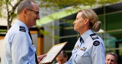 Chief of Air Force Air Marshal Mel Hupfeld congratulates Warrant Officer of the Air Force Fiona Grasby on her appointment as the ninth WOFF-AF, during a changeover ceremony at Russell Offices, Canberra. Photo by Corporal Veronica O'Hara.