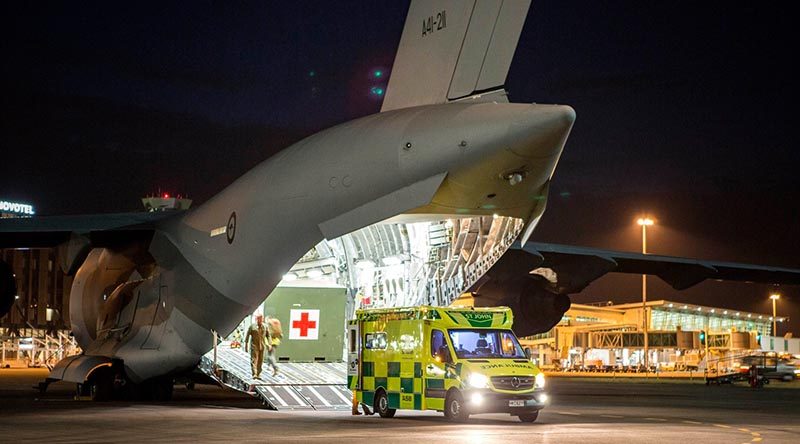 The Aussies arrive in Christchurch, New Zealand, well equipped to repatriate Australian's injured in the White Iland volcano eruption. RAAF photo.