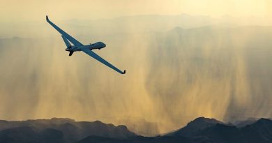 MQ-9B SkyGuardian seen flying into a pretty sunset with, to the relief of many RAAF officers, not a single weapon in sight. Photo credited to Business Wire, from the General Atomics web site.