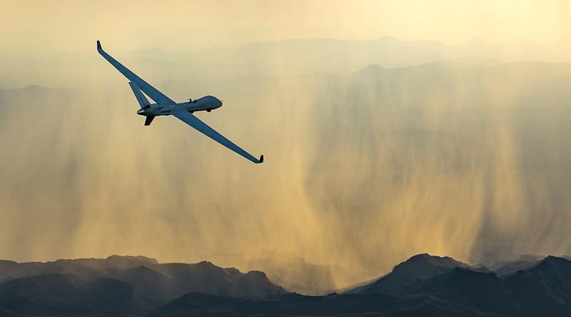 MQ-9B SkyGuardian seen flying into a pretty sunset with, to the relief of many RAAF officers, not a single weapon in sight. Photo credited to Business Wire, from the General Atomics web site.